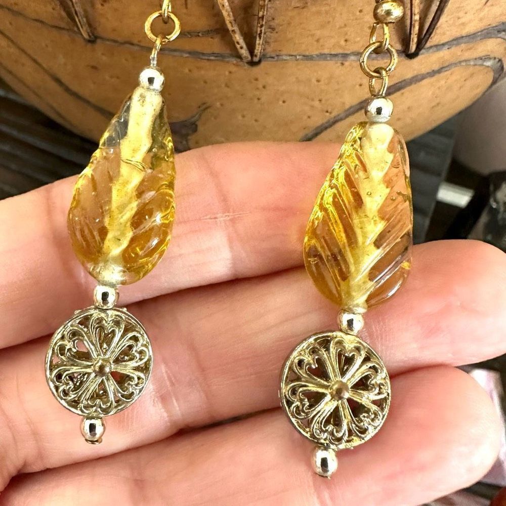 Gold tone long beaded drop earrings